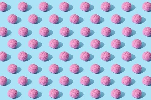 Pink brain‑shaped candles grid, mental overthinking